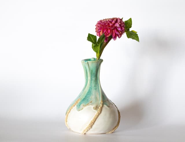 Green glazed ceramic vase